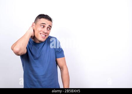 Shy man. White background, Medium shot Stock Photo