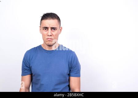 Sad man. White background, Medium shot Stock Photo