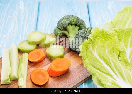fresh vegetables on a wooden table. The concept of healthy eating. Vegan, vegetarian. Stock Photo