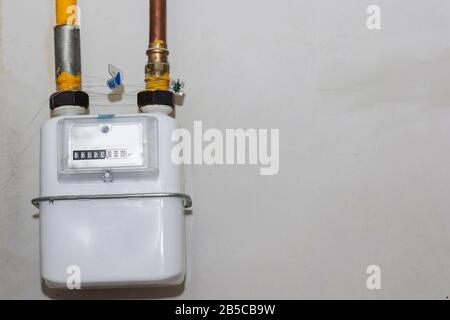 A gas meter in the private house, counter for distribution domestic gas. Stock Photo