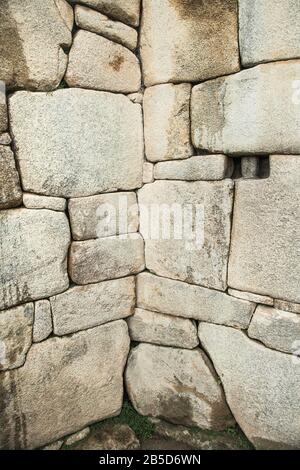 Incredible Inca Wall on Ancient city of Machu Picchu in Peru. South America.  Archaeological site. Stock Photo