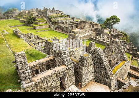 Machu Picchu Pueblo,  Peru - Jan 7, 2019:  Panoramic view on Ancient city of Machu Picchu in Peru. South America. Stock Photo