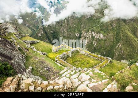 Machu Picchu Pueblo,  Peru - Jan 7, 2019:  Panoramic view on Ancient city of Machu Picchu in Peru. South America. Stock Photo