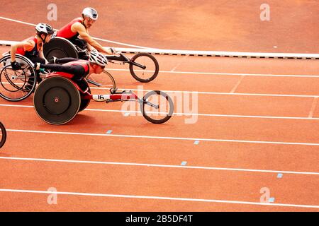 PARIS, FRANCE - JUNE 18, 2018: Disabled handicapped sportsman competition with men in action view from side Stock Photo