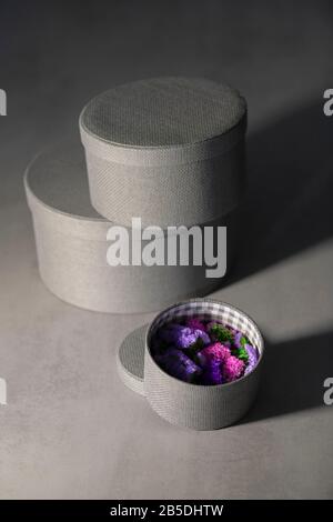 Different sized round boxes with beautiful flowers Stock Photo