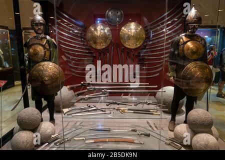 Turkish armours of Sipahi warrior from Ottoman empire, arms, shields, curved, swords, sabers, muskets in the Palace Armoury museum in Grandmaster Pala Stock Photo