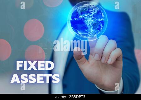 Text sign showing Fixed Assets. Business photo showcasing longterm tangible piece of property or equipment a firm owns Elements of this image furnishe Stock Photo