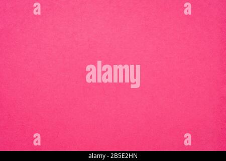 background and texture of hot pink handmade Indian paper created from recycled cotton fabric Stock Photo