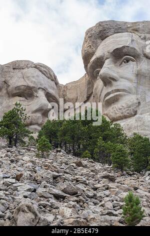 The faces of presidents Roosevelt and Lincoln on Mt. Rushmore in South Dakota. Stock Photo