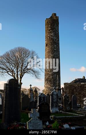 Old Abbey and Round Tower, and Celtic Crosses in Monasterboice, County Louth, Ireland Stock Photo