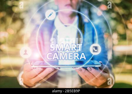 Conceptual hand writing showing Smart Camera. Concept meaning individual image processing systems designed to automate Stock Photo