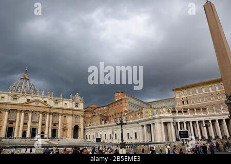 Vatican Obelisk, Maderno Fountain, Bernini´s Colonnade and Saint Peter´s Basilica on the Saint Peter´s Square in the city of Rome Stock Photo