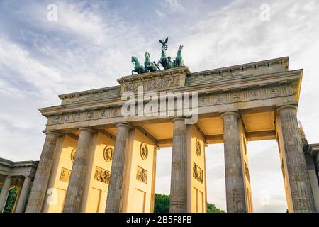 Brandenburg gate at sunset, german iconic interest location in Berlin Stock Photo