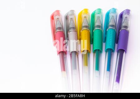 Set of color plastic gel pens with metallic colors, isolated on white background Stock Photo