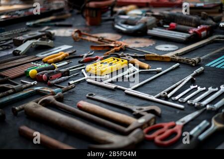 Photo top view a huge set collection of working hand and power tools many for the wooden on isolated black background, Toolset with interior,  do-it-y Stock Photo
