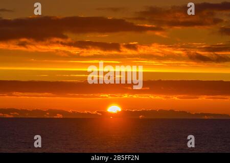 Sunset over the ocean Stock Photo