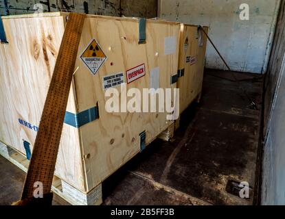 Radiation warning sign on the Hazardous materials transport label sticker Class 7 at the container of transport truck Stock Photo