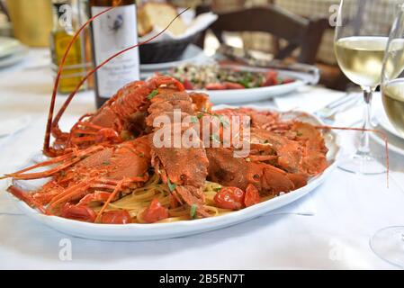 Traditional Mediterranean lobster with spaghetti Stock Photo