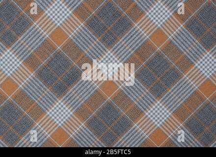 Grey brown scottish plaid fabric tartan texture background Stock Photo
