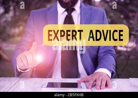 Handwriting text Expert Advice. Conceptual photo Opinion given by someone skilled at a particular job Businessman with pointing finger in front of him Stock Photo