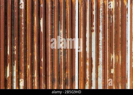The corrosion of rusted galvanized zinc is the background. Stock Photo