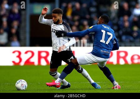 Derby County's Jayden Bogle (left) and Blackburn Rovers' Amari'i Bell battle for the ball during the Sky Bet Championship match at Pride Park, Derby. Stock Photo