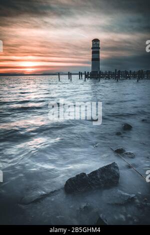 Lighthouse in Podersdorf am See at sunset, lake Neusiedler See, Burgenland, Austria Stock Photo