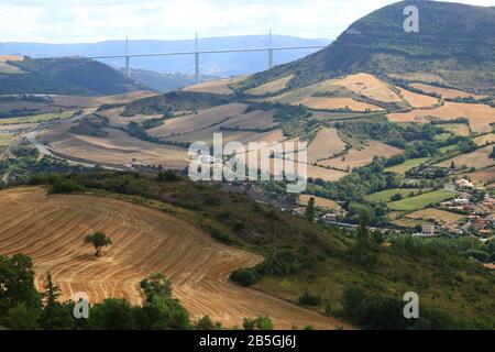 A morning in July, the Millau viaduct seen from the hamlet of Luzençon (Tarn valley, Aveyron, France) Stock Photo