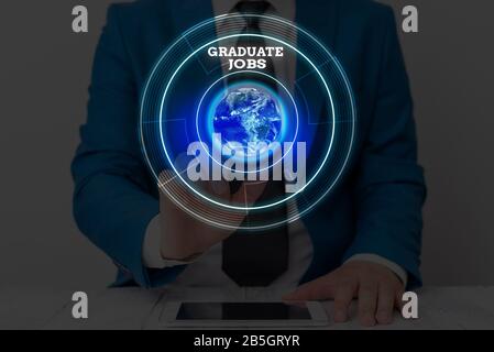 Text sign showing Graduate Jobs. Business photo showcasing require someone to hold a degree to start their career Elements of this image furnished by Stock Photo
