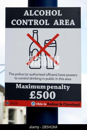Warning sign Alcohol Control Area drinking alcohol in public places prohibited maximum Penalty £500. Stock Photo