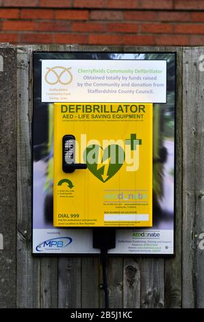 Stone / United Kingdom - March 8 2020: Defibrillator seen in a public place in small town Stone, UK. Obtaind on donations. Stock Photo