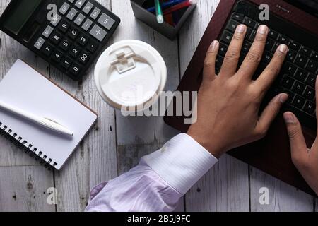 business person working on laptop, top view  Stock Photo