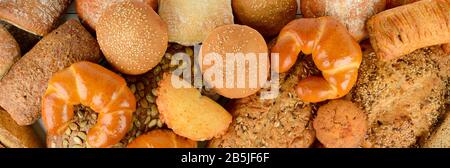 Bread, buns, croissants and other baked goods. Top view. Stock Photo