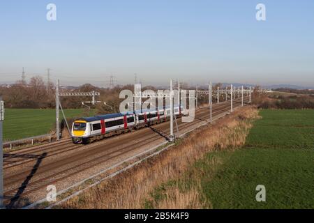 Transport for Wales Bombardier class 170 turbostar train 170202 passing Coedkernew  on the south Wales mainline Stock Photo