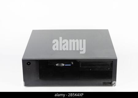 The old desktop computer, PC with floppy disk drive and cd drive on white background Stock Photo