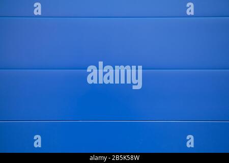Background, texture of blue metal wall. Close up. Stock Photo