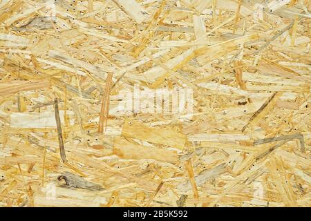 Pressed sawdust as background and texture. Close up. Stock Photo