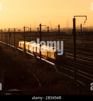The Network Rail New Measurement train on the south Wales main line glinting in the setting sun