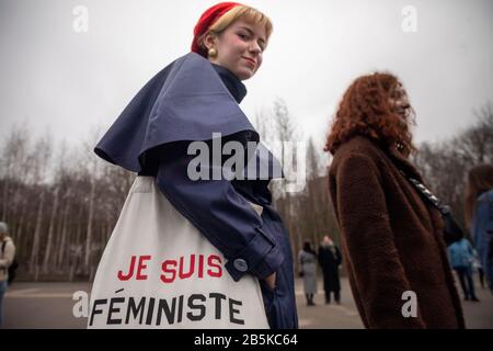 Moscow, Russia. 8th of March, 2020 A participant in a rally 'March 8 - celebrate the holiday correctly' for women's solidarity and women's rights, organized by the group of female activists to mark International Women's Day in Moscow's Sokolniki Hyde Park.The protesters stand out for a draft law protecting women from domestic violence, for equality, against sexism, female objectification, and political repression