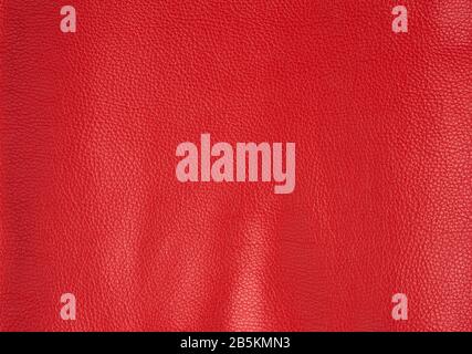 texture of bright red cow leather, scarlet color, full frame Stock Photo