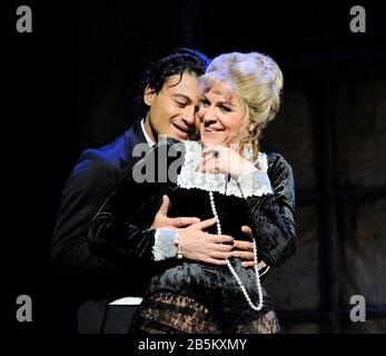 Vittorio Grigolo (Faust), Angela Gheorghiu (Marguerite) in FAUST by Gounod conductor: Evelino Pido set design: Charles Edwards costumes: Brigitte Reiffenstuel lighting: Paule Constable director: David McVicar  The Royal Opera, Covent Garden, London WC2 18/09/2011 Stock Photo