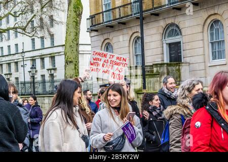 LONDON/ENGLAND – MARCH 8th 2020: Protesters at the MARCH 4 WOMEN protest in central London Stock Photo
