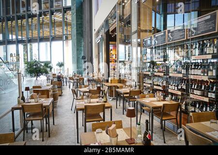 Coronavirus impact, empty restaurant and cafeteria tables.  Milan, Italy - March 2020 Stock Photo