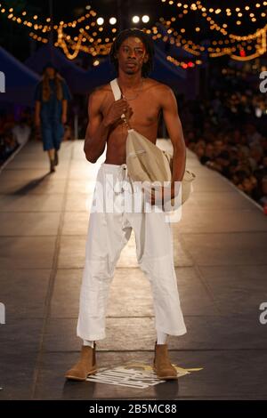 A model poses on the runway at the Waxman House fashion show Stock Photo -  Alamy