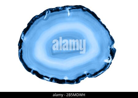 Abstract background - agate mineral cross section isolated on white background, color of the year 2020 pantone classic blue 19-4052 Stock Photo