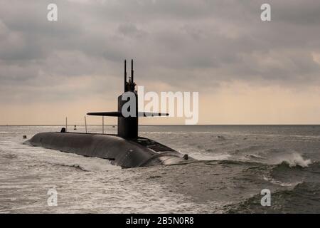 The U.S. Navy Ohio-class nuclear-powered ballistic missile USS Maryland transits the Saint Marys River as it returns to homeport at Naval Submarine Base Kings Bay August 1, 2012 in Kings Bay, Georgia Stock Photo