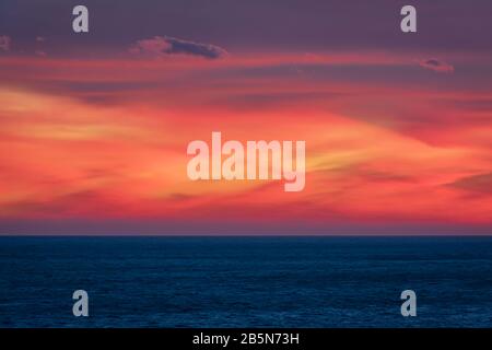 Sky and sea of colors on a winter sunset Stock Photo
