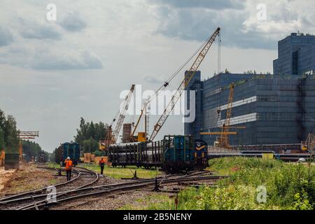 Freight trains with cargo on railroad junction. Stock Photo