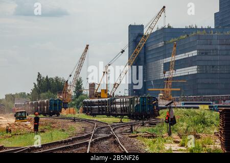 Freight trains with cargo on railroad junction. Stock Photo