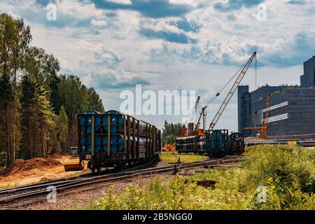 Freight trains with cargo on railroad junction. Stock Photo